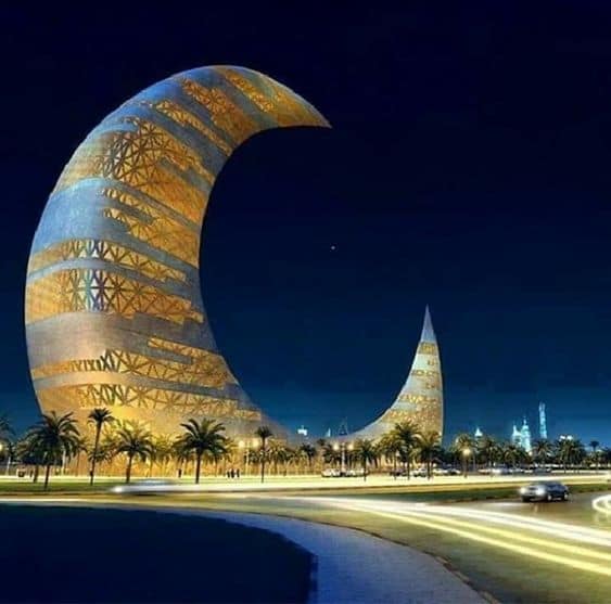 La "Burj a-Khalifa" illuminata nel buio, Dubai vicina all'Italia