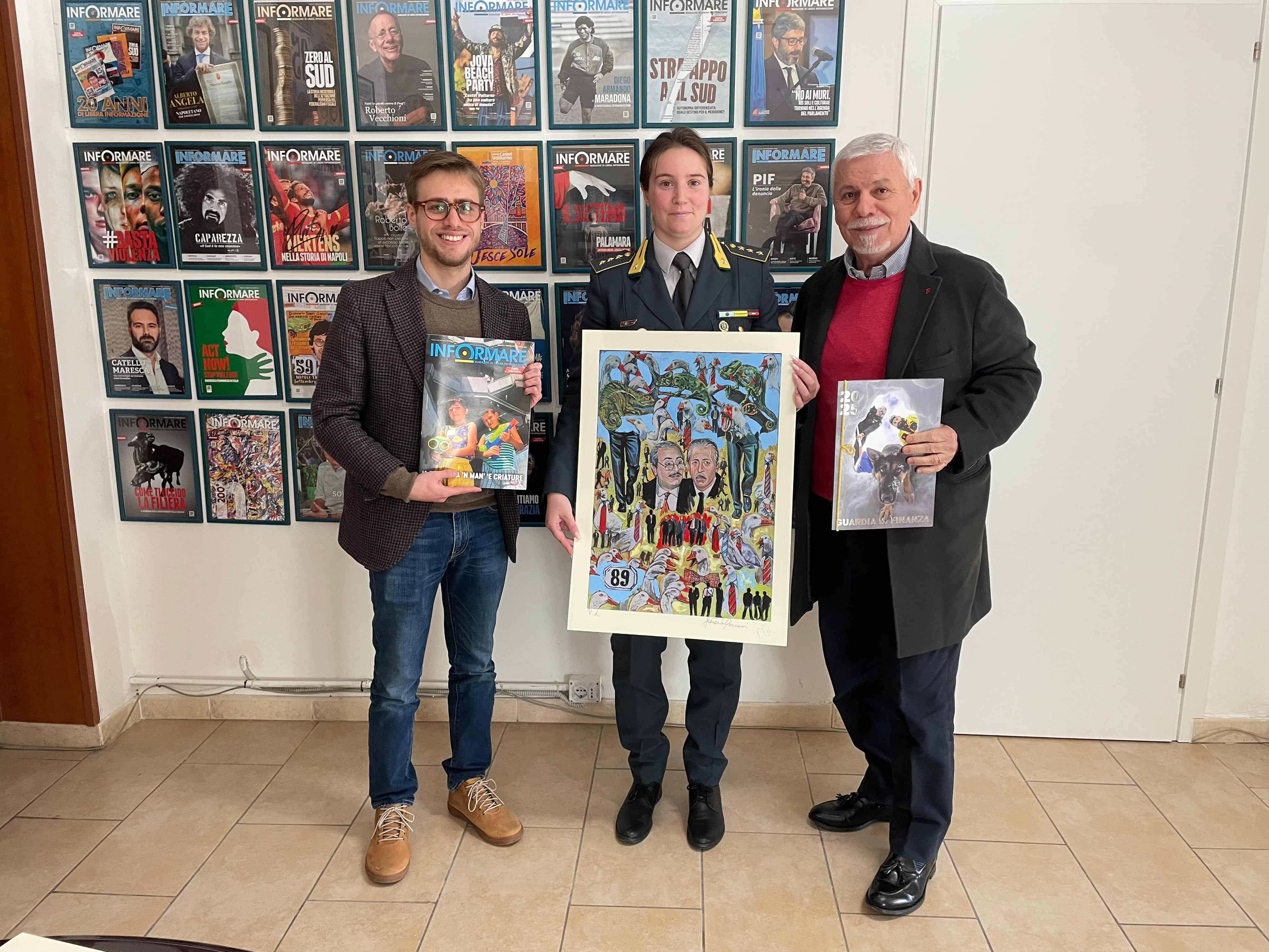 GDF, il Capitano di Mondragone Lo Russo in visita da Informare per gli auguri